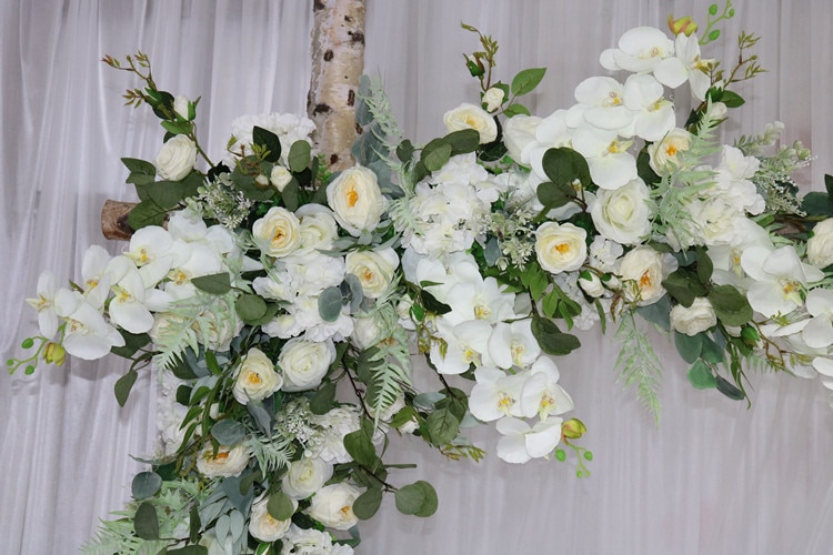 Techniques for securing flowers to the wedding arch